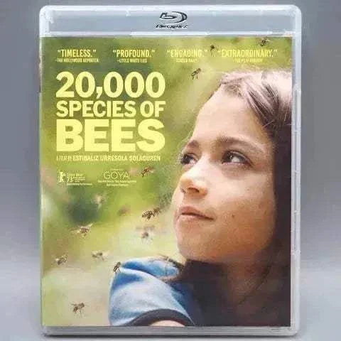 20,000 Species of Bees Blu-Ray with slipcover featuring a thoughtful child surrounded by bees on the front cover.