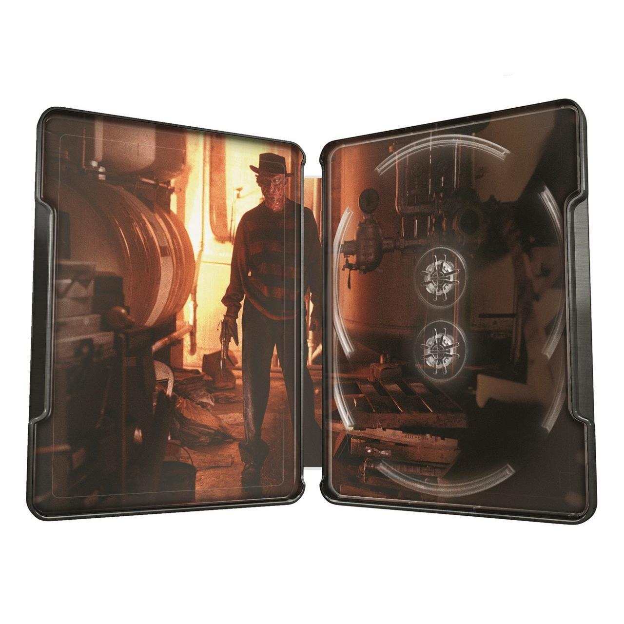 Open limited edition A Nightmare On Elm Street steelbook case with eerie industrial interior and Freddy Krueger silhouette