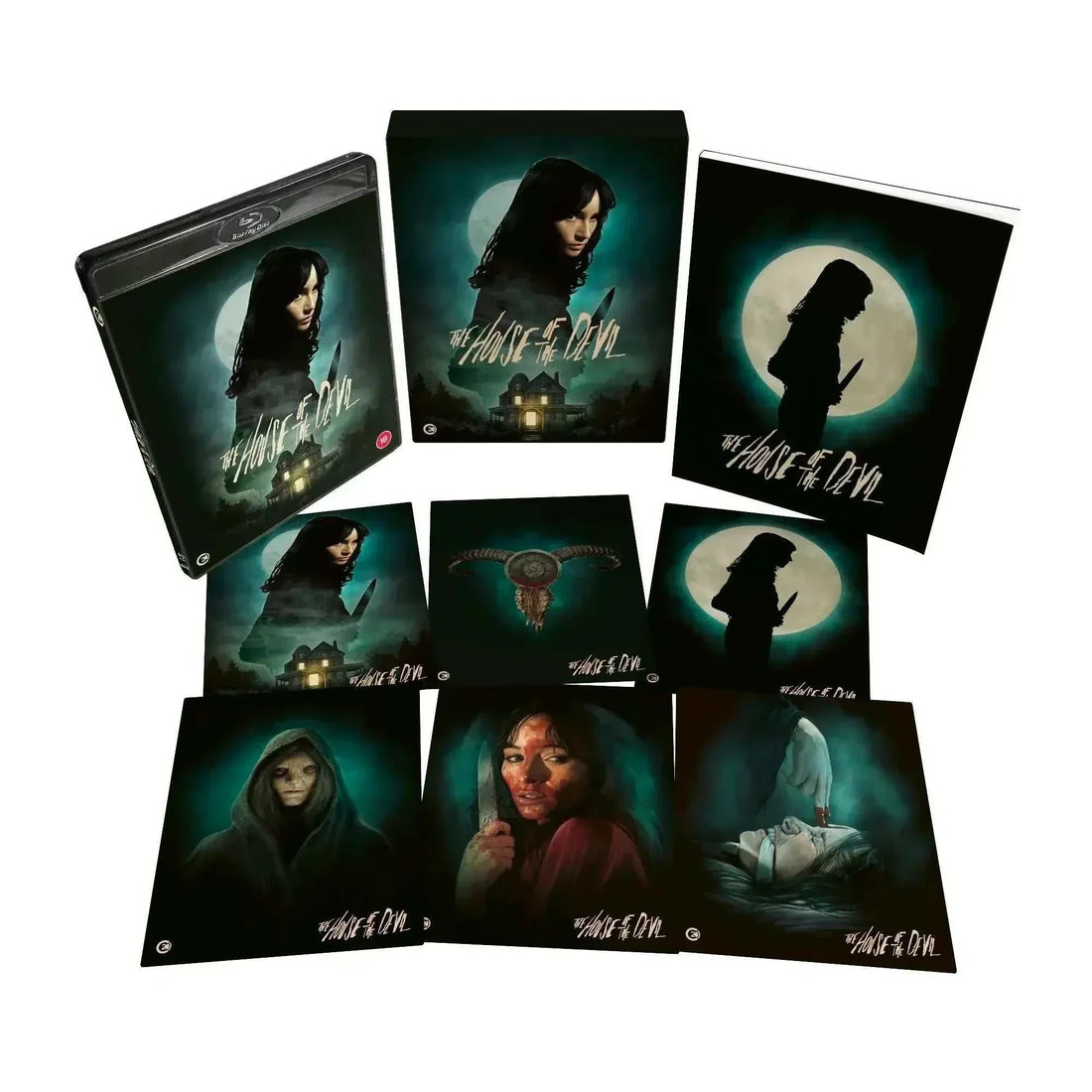The House of the Devil Limited Edition Blu-Ray with rigid slipcase and extras featuring horror movie cover art with woman holding knife and eerie house under full moon.