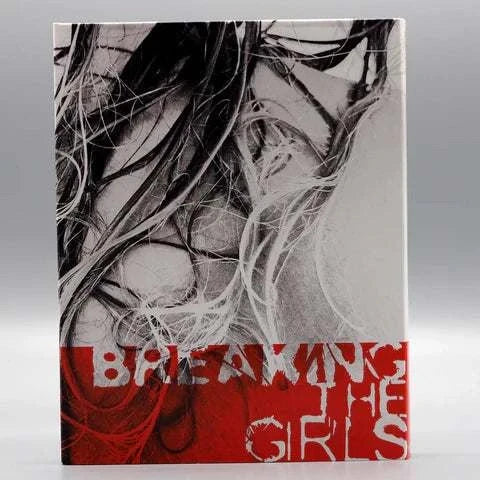Breaking the Girls Blu-Ray slipcover with black and white abstract hair design and red title text.