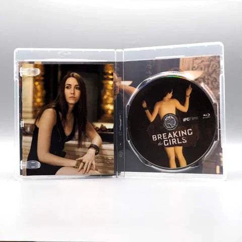 Breaking the Girls Blu-Ray disc and inside cover featuring a woman sitting, in a clear plastic case with slipcover.