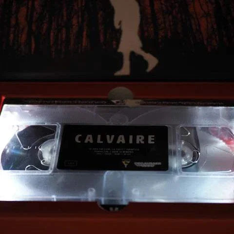Degausser Video Calvaire Limited Edition Deluxe LED VHS on display with backlit illumination.
