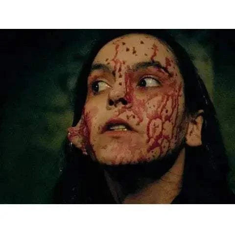 Close-up of a woman’s face covered in blood from the horror film Bleeding Skull Disembodied 4K UHD with Blu-Ray slipcover edition.