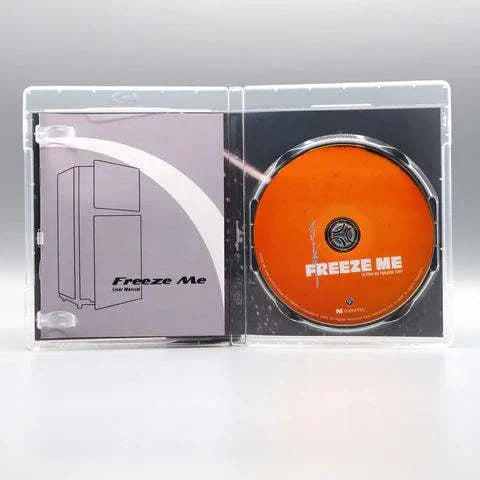 Kani - Freeze Me Blu-Ray open case showing orange disc and booklet insert.