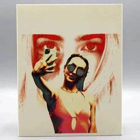 Shudder Influencer Blu-Ray cover featuring a grid of social media-style photos of a woman with changing facial expressions and an Instagram-like interface design.