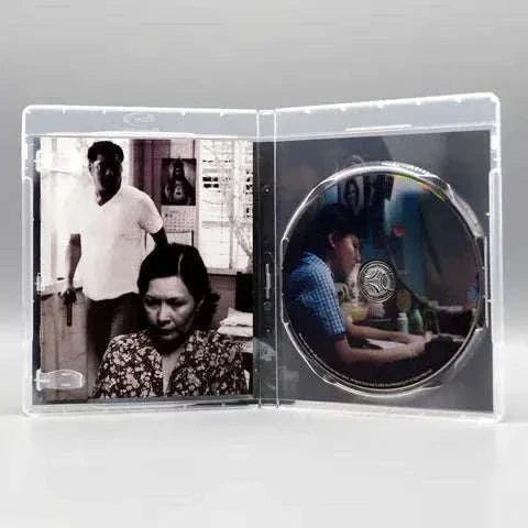 Kisapmata Blu-Ray with slipcover inside view showing disc and black-and-white film scene.