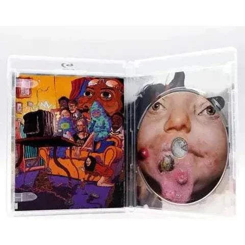 Shudder - Kuso Blu-Ray with slipcover showing vibrant artwork and disc design.