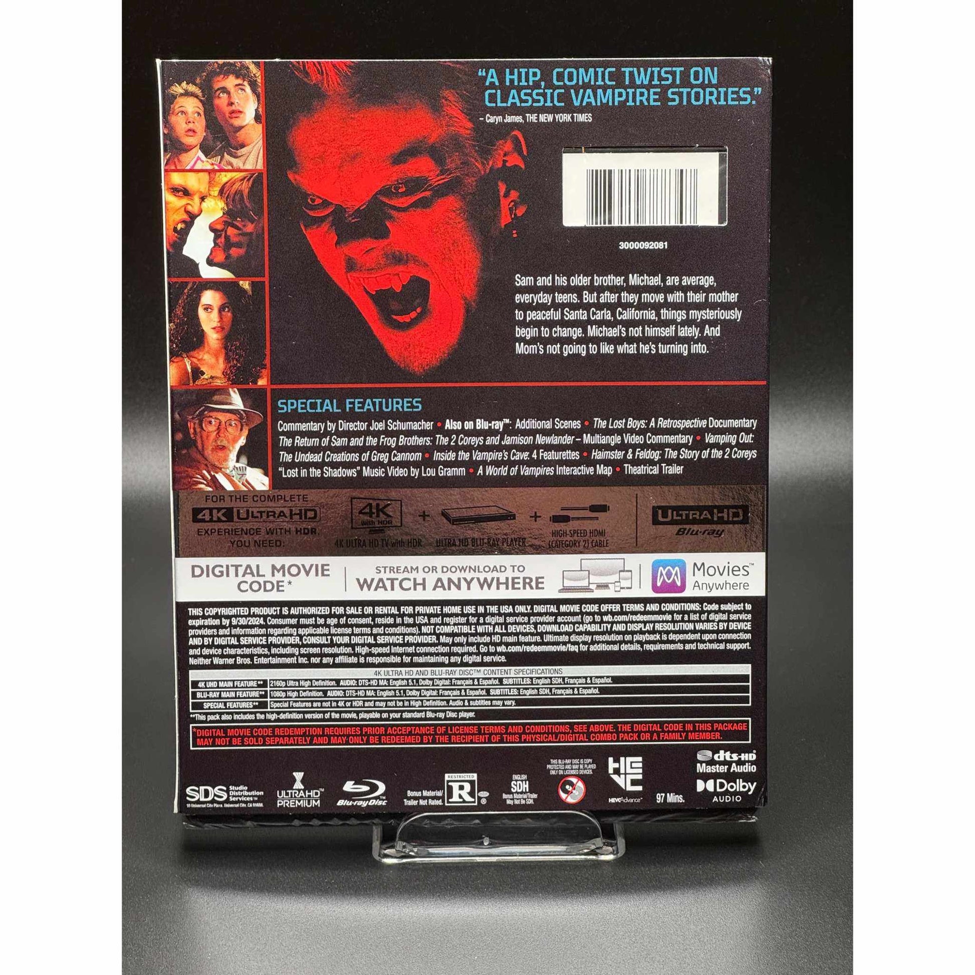 Lost Boys 4K UHD Blu-Ray pre-owned slipcover back view showing special features and movie details.