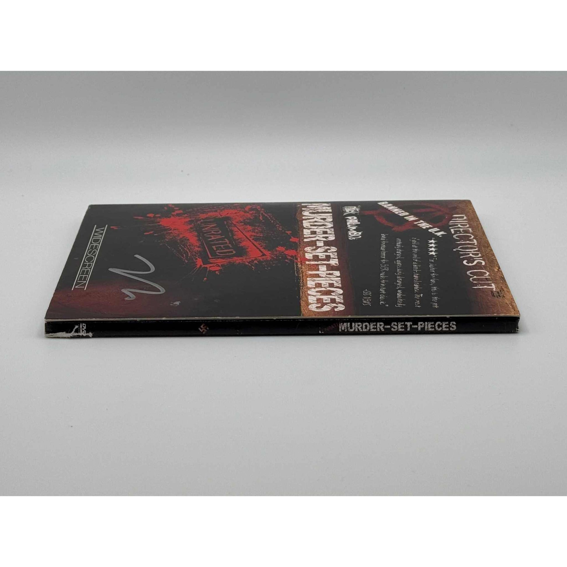 Murder-Set-Pieces DVD, used original unrated director's cut, signed by director, showing edge wear and minor damage.