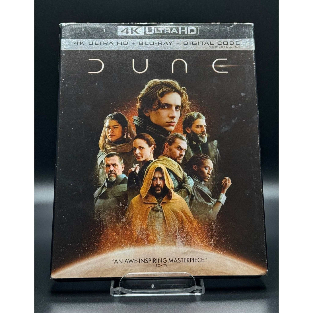 Dune: Part One 4K UHD + Blu-Ray with worn slipcover, featuring cast image, special features, and good disc condition.