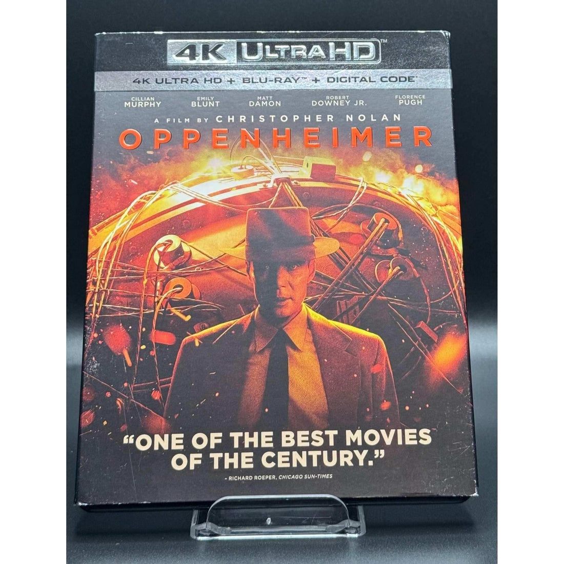 Oppenheimer 4K UHD Blu-Ray with slipcover showing wear, used condition.