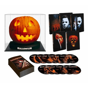 Limited Edition Halloween I-V 4K UHD and Blu-ray collection with hand-painted Jack O’Lantern display case, steelbook covers, multiple discs, and booklet.
