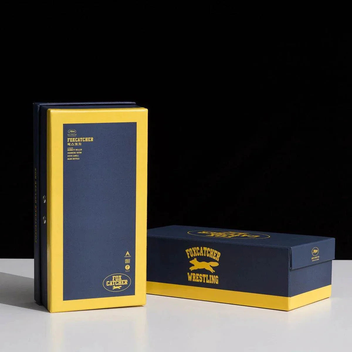 Foxcatcher Deluxe Box Blu-ray Steelbook with navy and yellow color scheme and exclusive packaging
