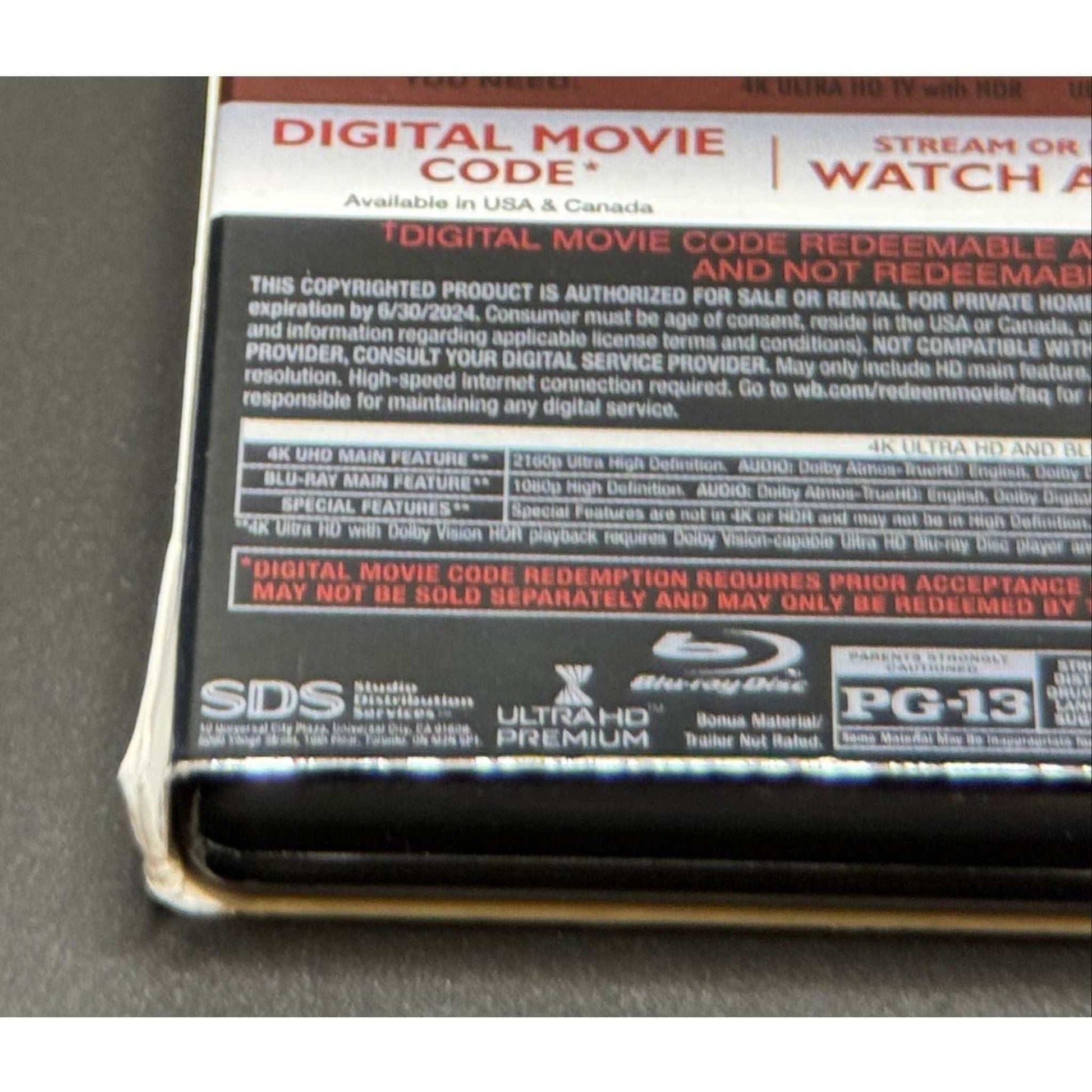 The Batman 4K UHD + Blu-Ray used disc with worn slipcover and special features list.