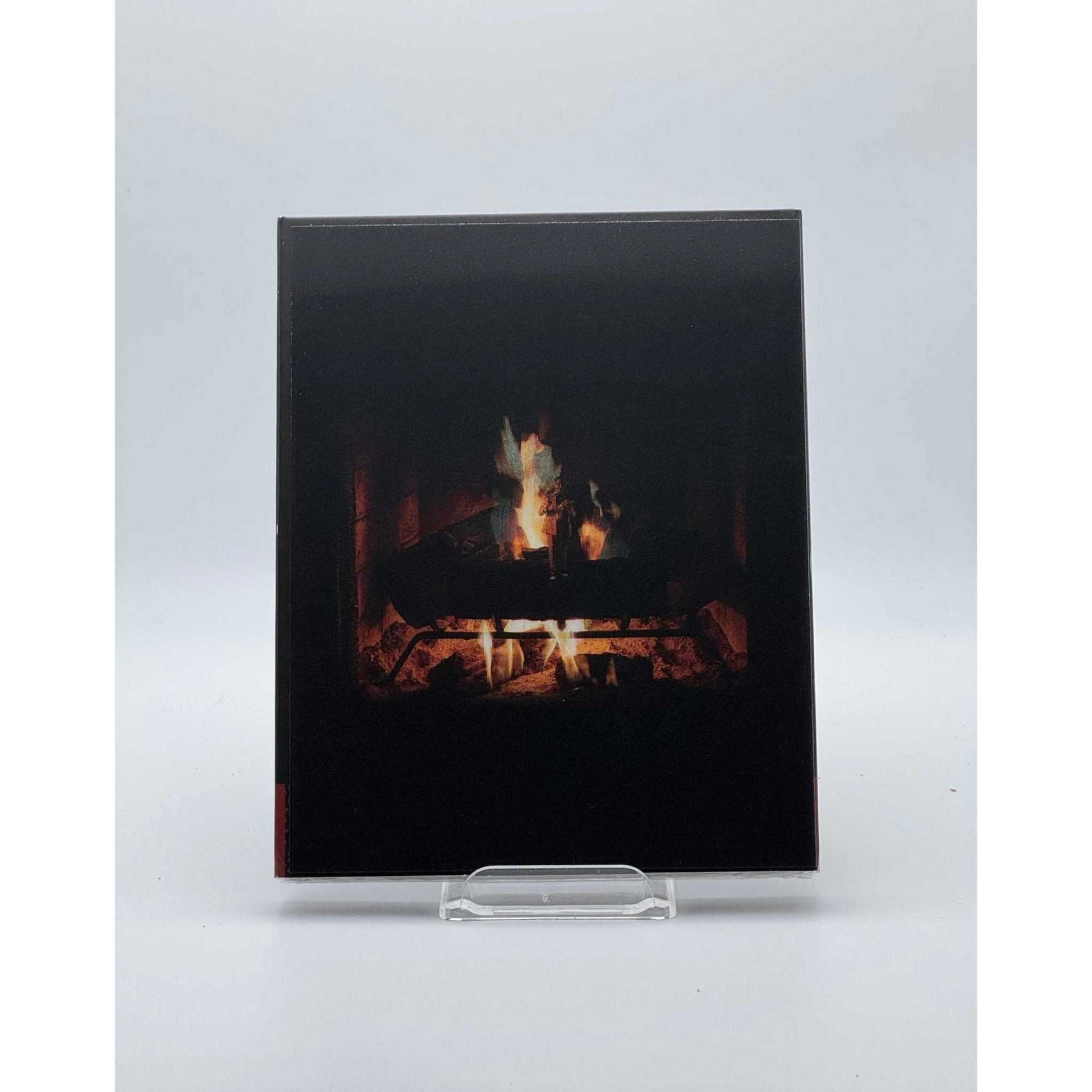 Dekanalog Adult Swim Yule Log Blu-Ray with lenticular slipcover featuring a cozy crackling fire design