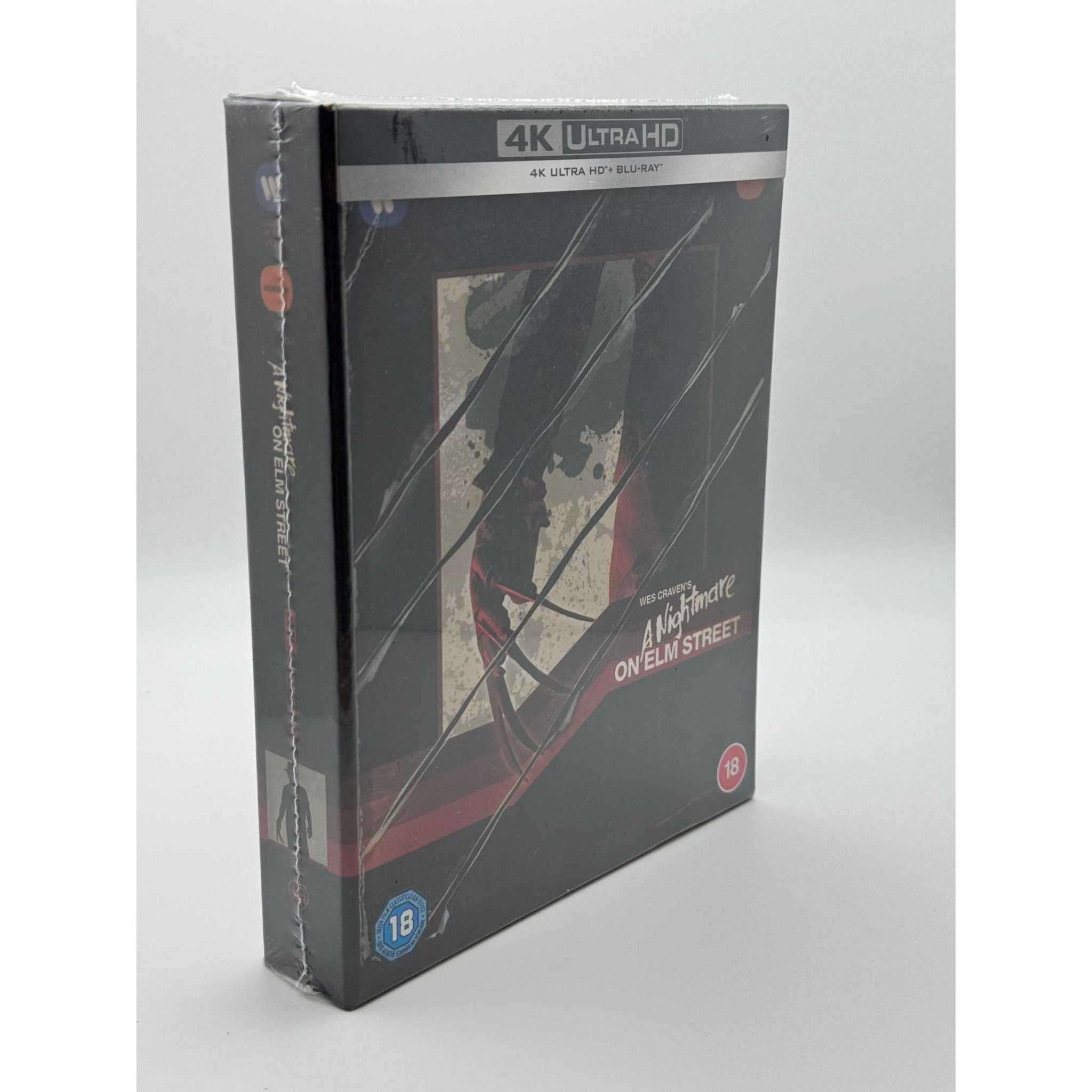 A Nightmare On Elm Street Limited Edition 4K Ultra HD Blu-Ray Steelbook with horror-themed cover and protective packaging