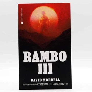 Rambo III novelization paperback book by David Morrell with red and black cover featuring a silhouette against a large red sun.