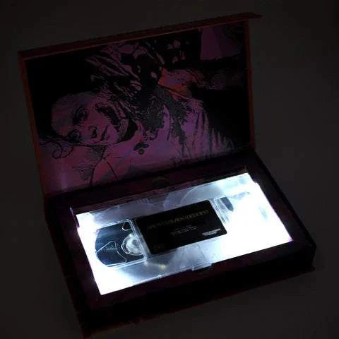 Limited edition deluxe LED VHS of "Satan's Black Wedding" in illuminated packaging.