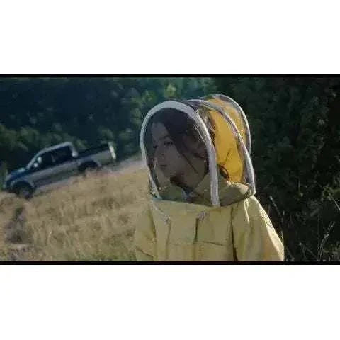Film Movement - 20,000 Species of Bees Blu-Ray cover featuring a child in a beekeeping suit.