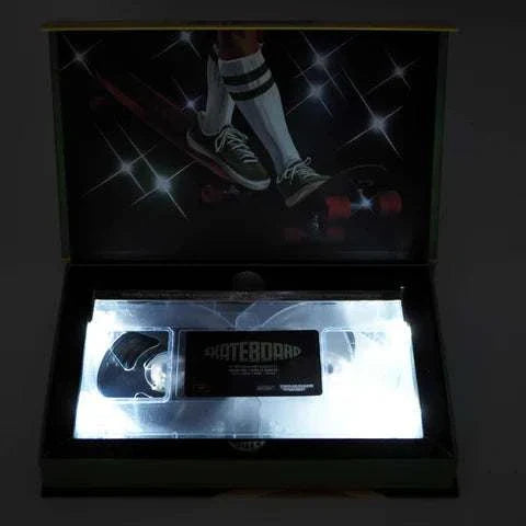 Limited Edition Deluxe LED VHS skateboard-themed collectible in protective box.