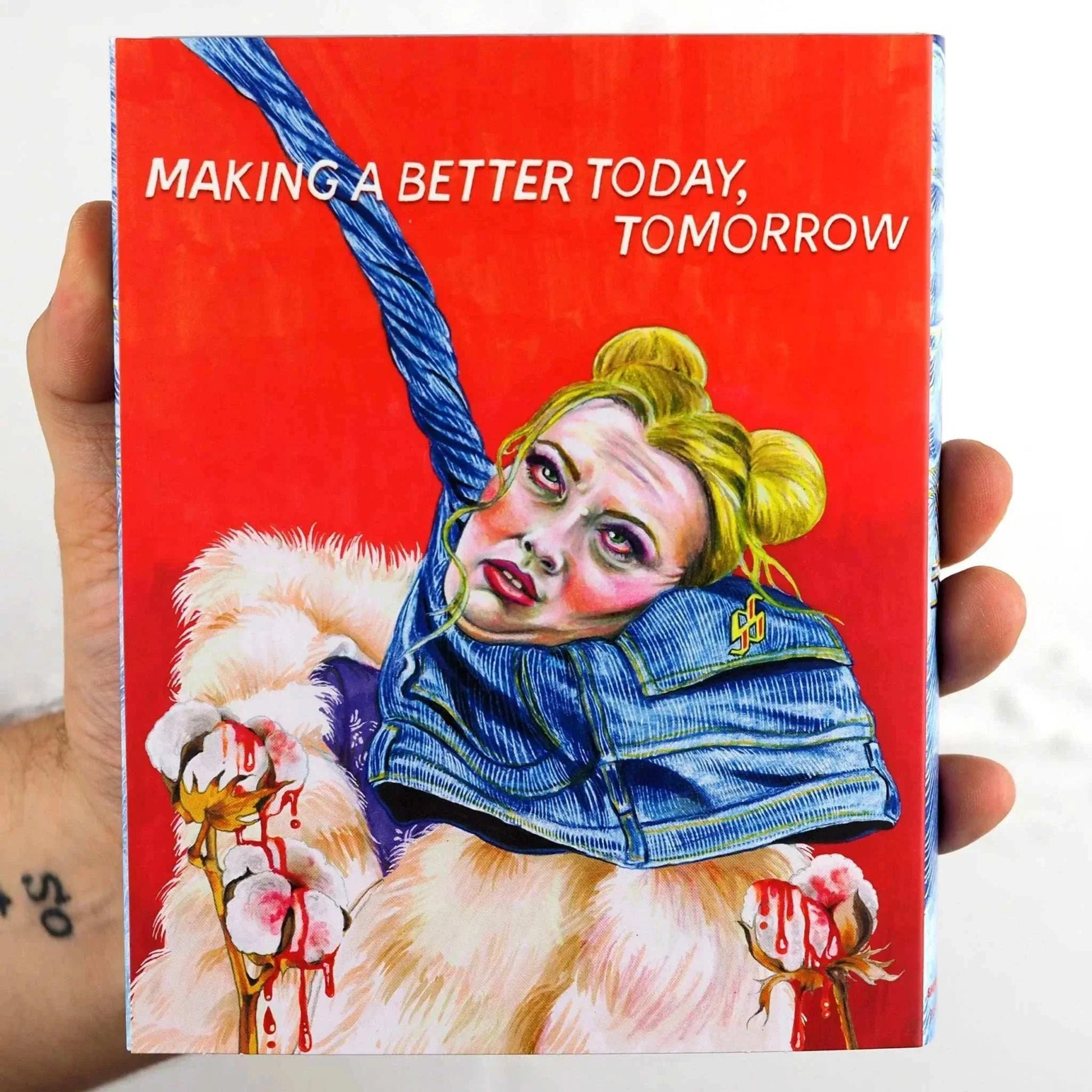 Blu-ray cover of Shudder - Slaxx horror film featuring a distressed woman entangled in a pair of blue jeans with the text "Making a Better Today, Tomorrow" on a red background.