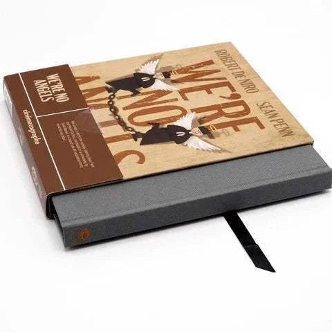 We're No Angels Blu-Ray in protective slipcase featuring art inspired by the 1989 film starring Sean Penn and Robert De Niro.