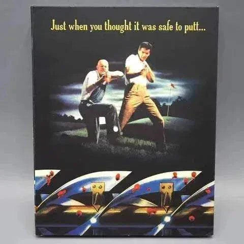 Vinegar Syndrome Blades Blu-ray slipcover featuring a terrified woman and a menacing lawn mower on a golf course at night