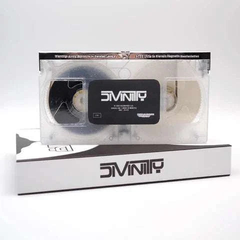 Degausser Video Divinity Limited Edition LED VHS set with white packaging.